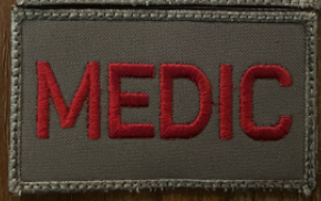 MEDIC (Velcro Patch ) Red Letters / Tan Patch 2" x 3 1/2"